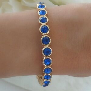 Mini ice stretch bracelet in golden with royal blue Swarovski crystals NWT